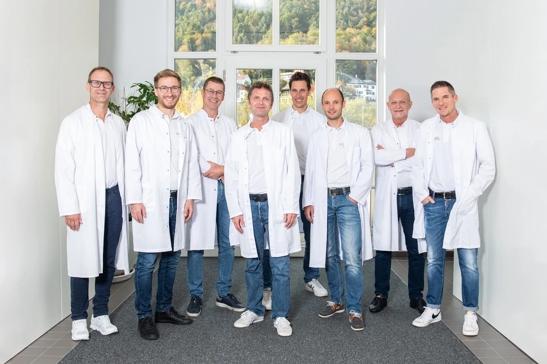 Die Ärzte der Praxisgemeinschaft in weißen Mänteln